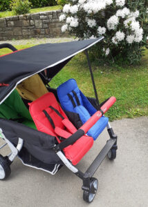 Poussette star multicolore sangle contre le vent